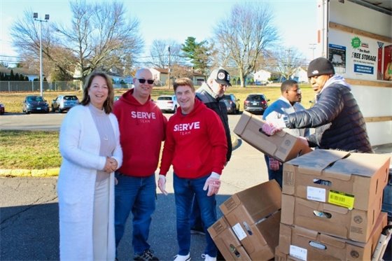 Borer helps Vertical Church give out turkeys to West Haven residents in need